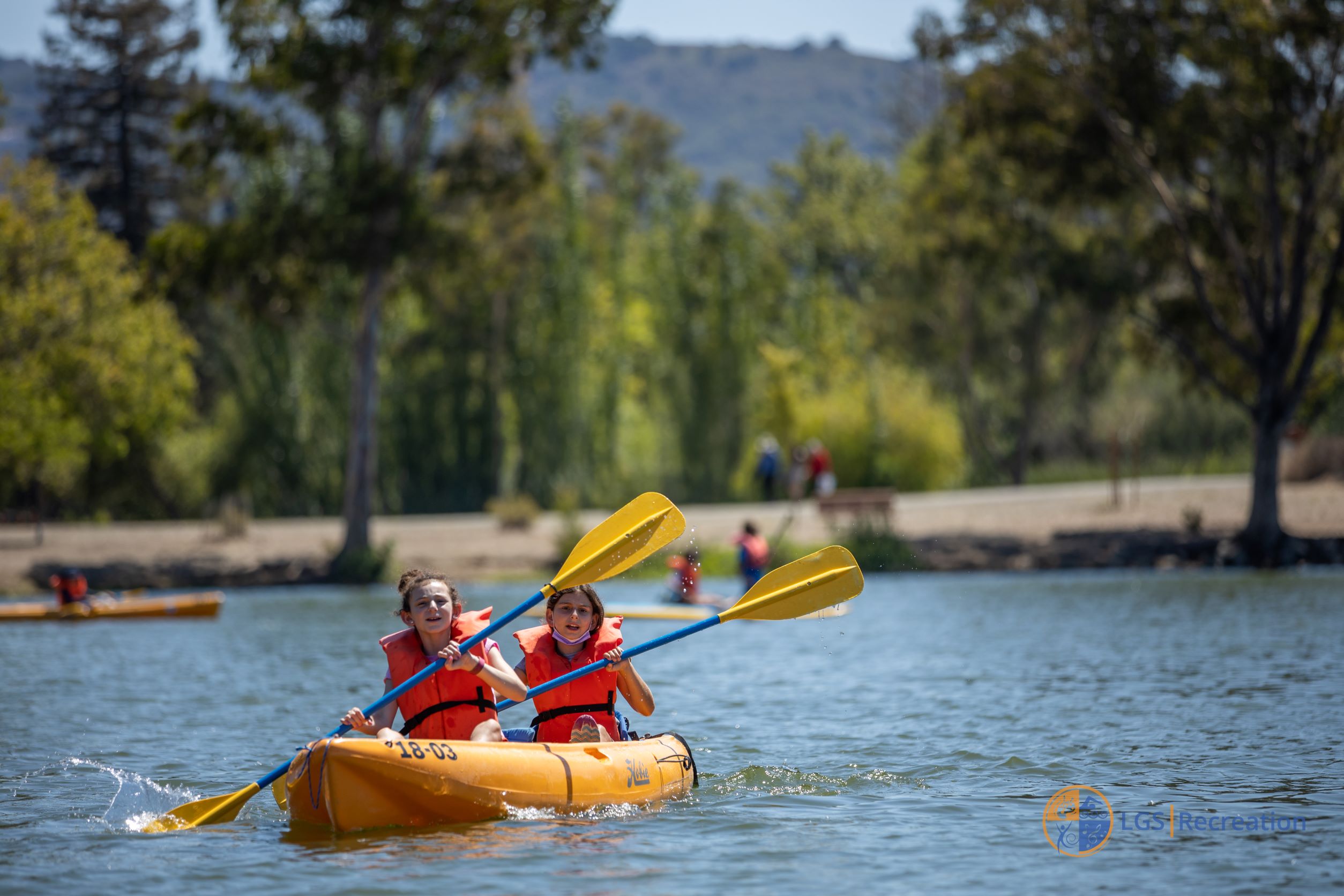 Kids in a kayak on vasona lake