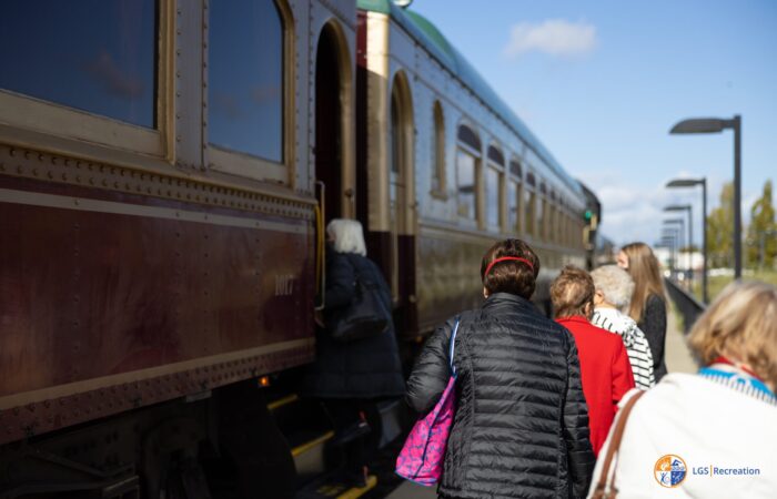 Napa valley wine train trip group getting on the train