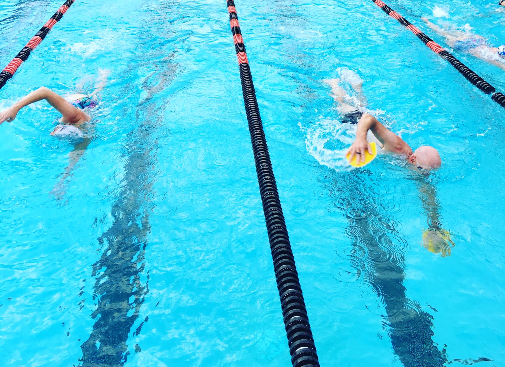 Two people Lap swimming