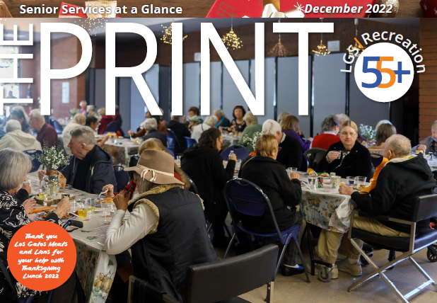 december print cover seniors at a holiday event