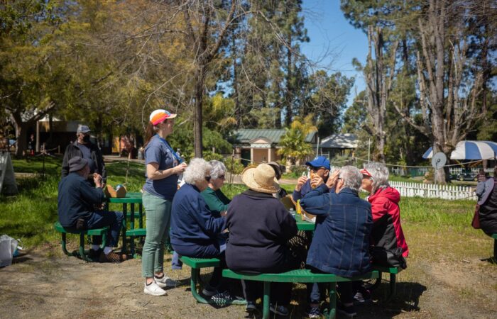 Oakland Zoo trip group sitting for picnic lunch