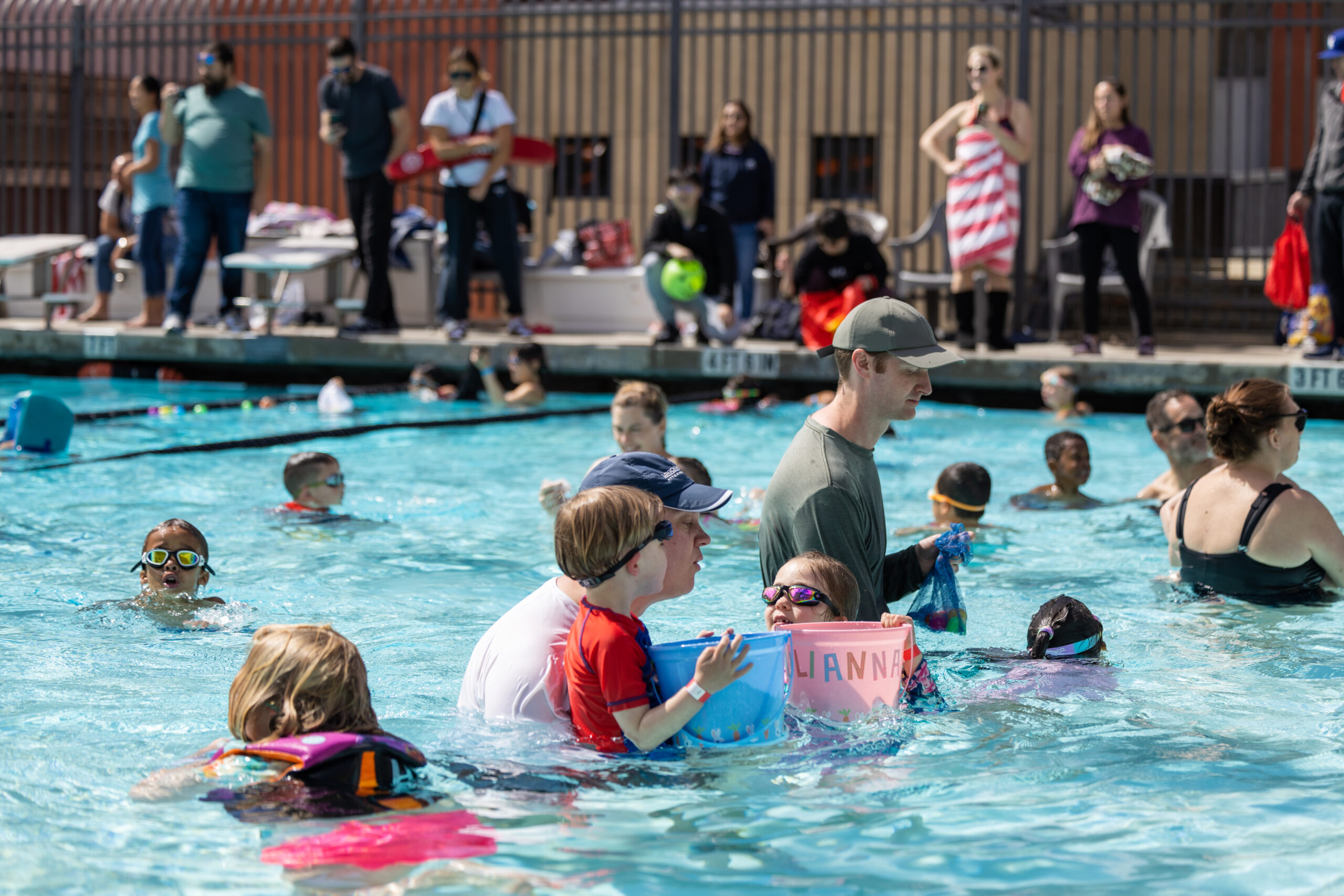 Underwate egg hunt kids looking for eggs underwater with parents help