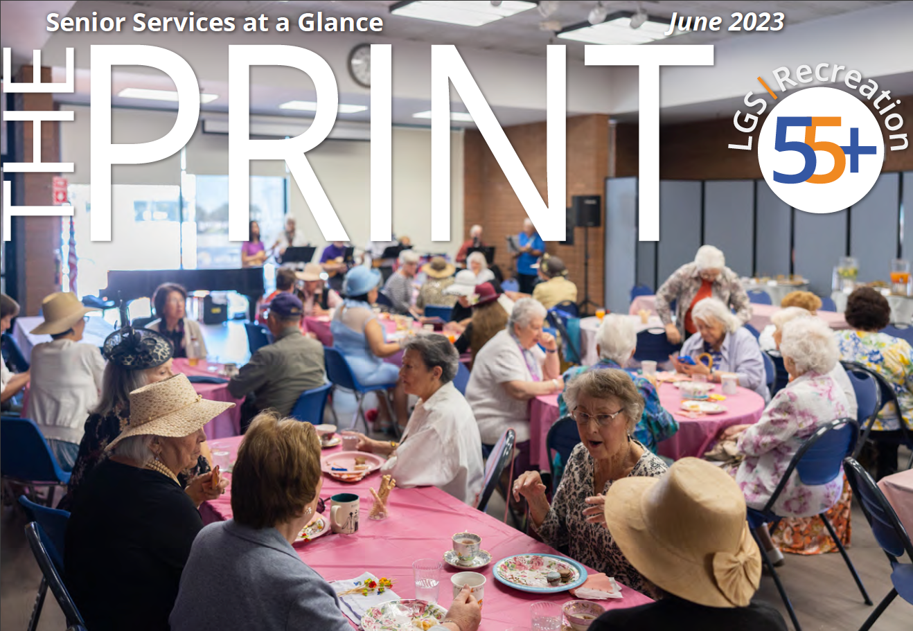 June print cover senior event with music band and groups of seniors at tables at the large hall