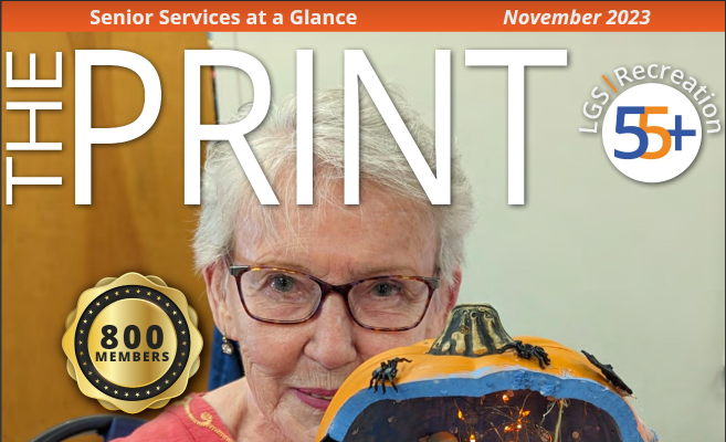 November Print cover 55 plus member with halloween diorama in a pumpkin