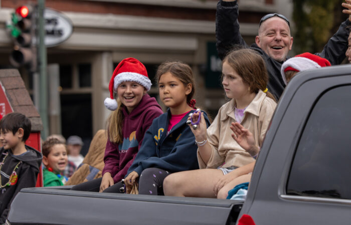 Holiday parade girls on a truck float