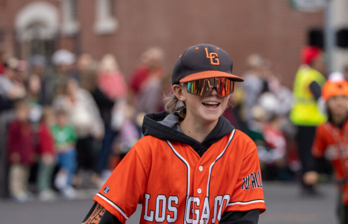 Holiday parade LG baseball kid