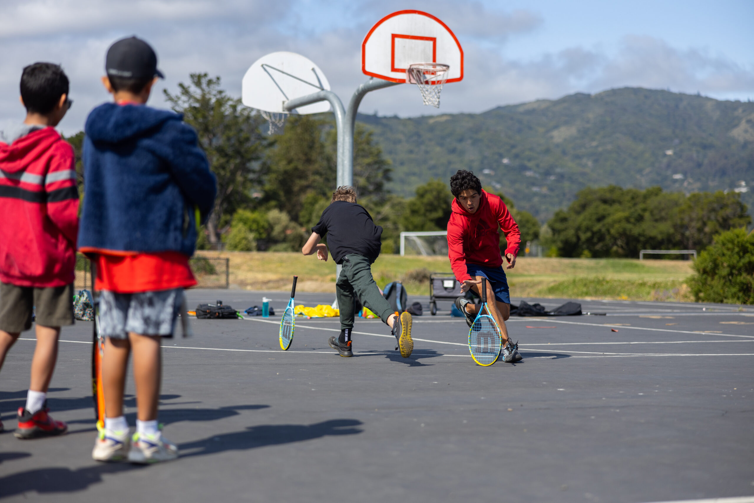 kids playing tennis racket game