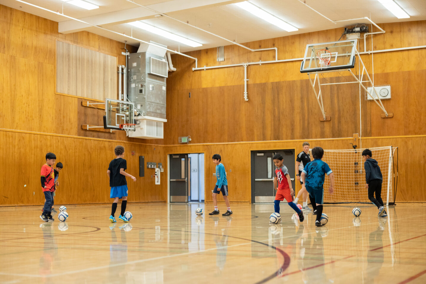 kids playing indoor soccer