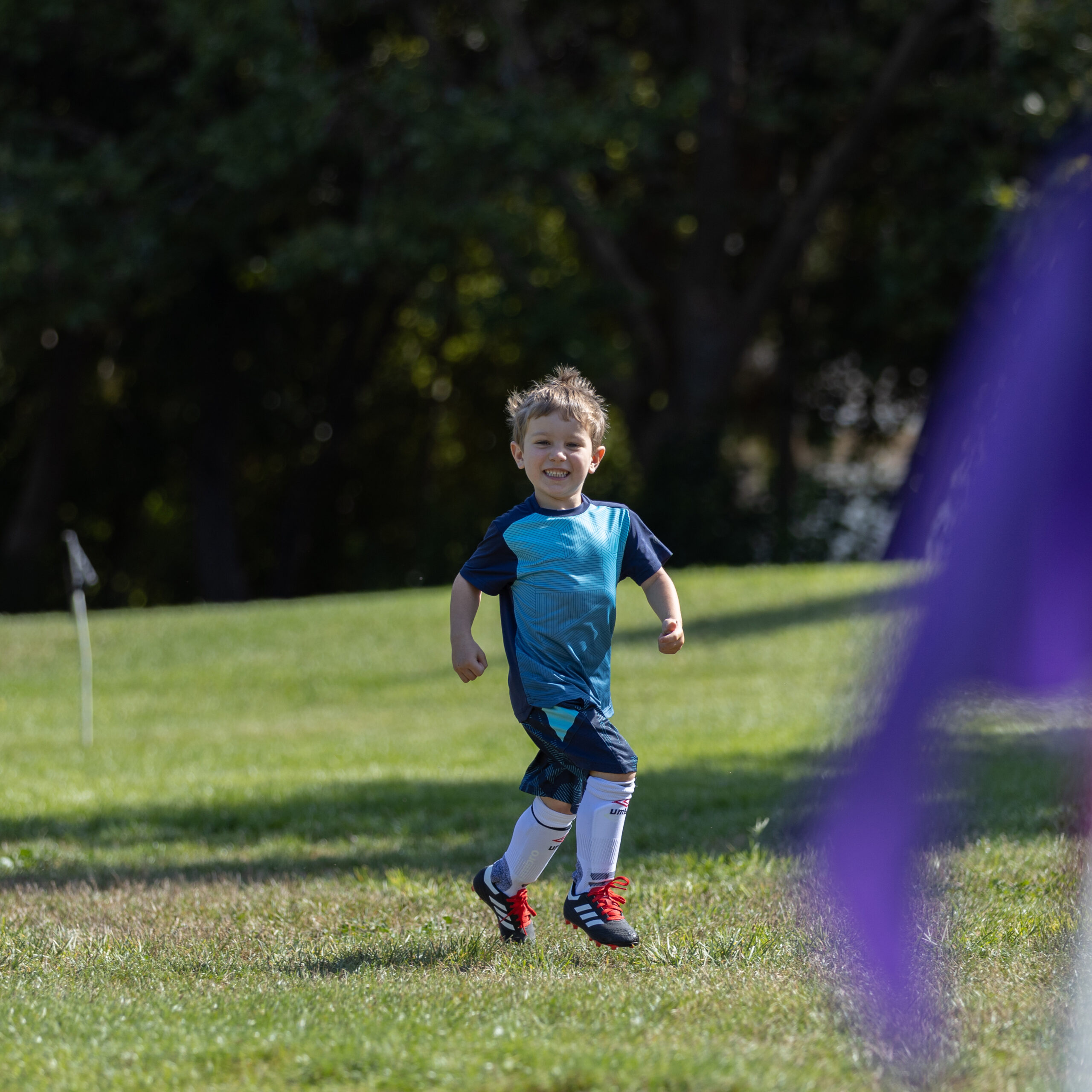 kid playing soccer