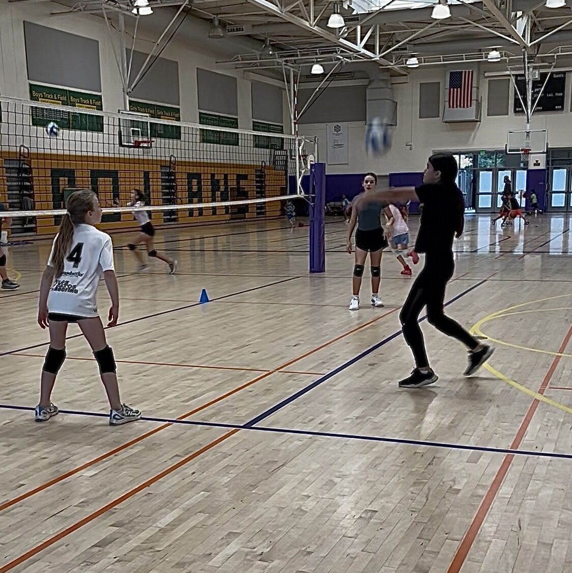 volleyball player hitting the ball